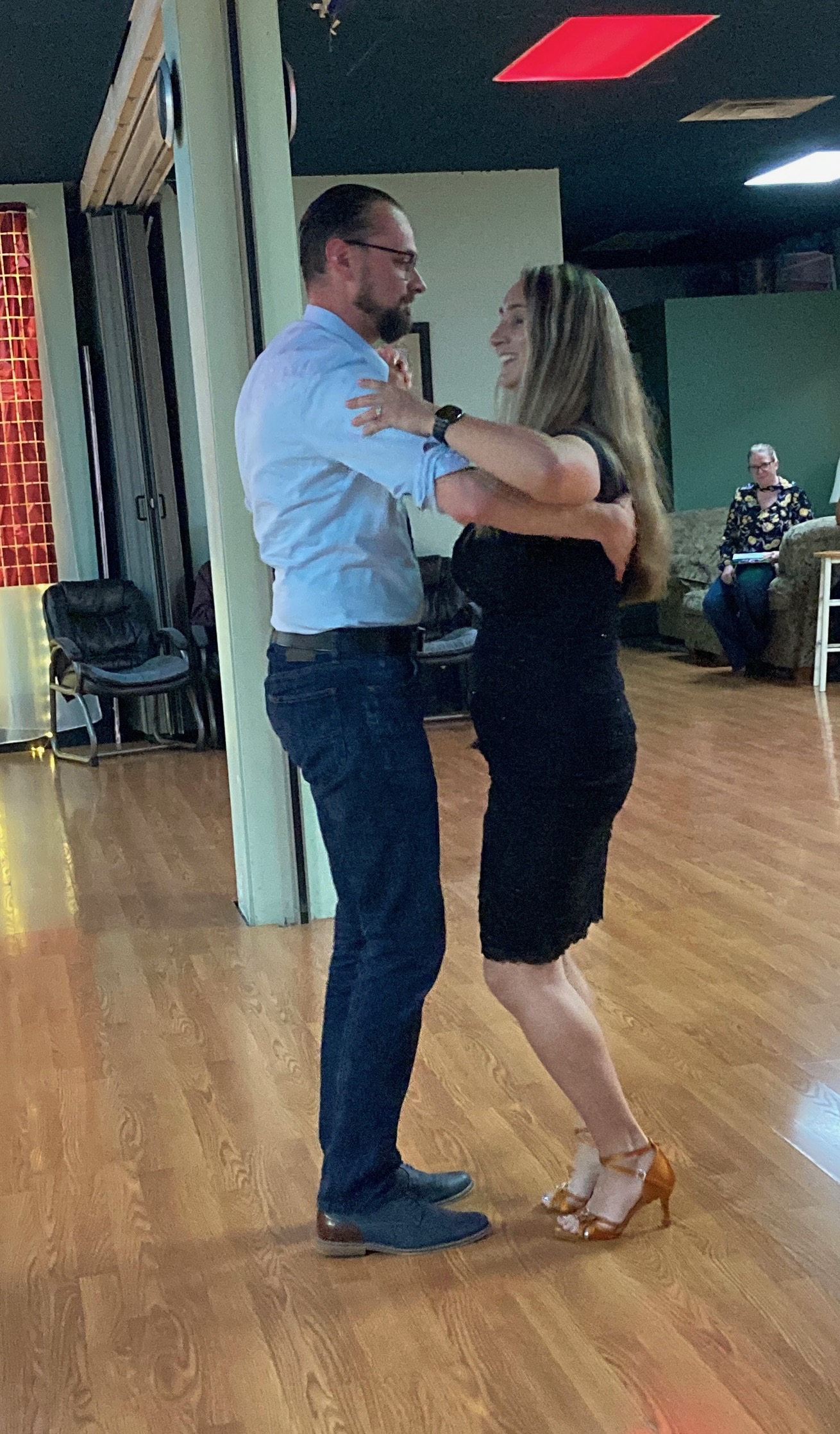 A DanceFun instructor working one-on-one with a student