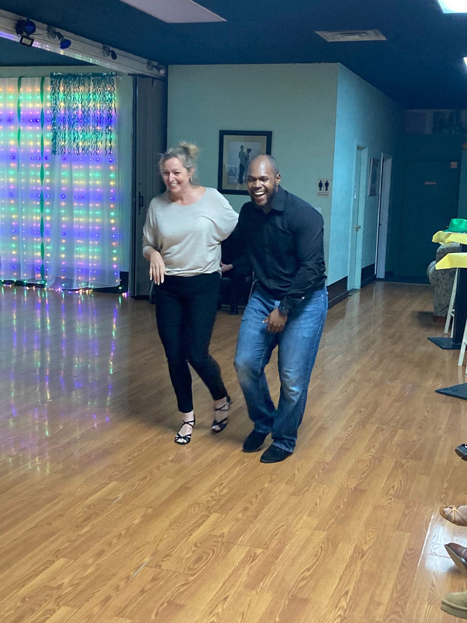 Students laughing and enjoying themselves during dance class