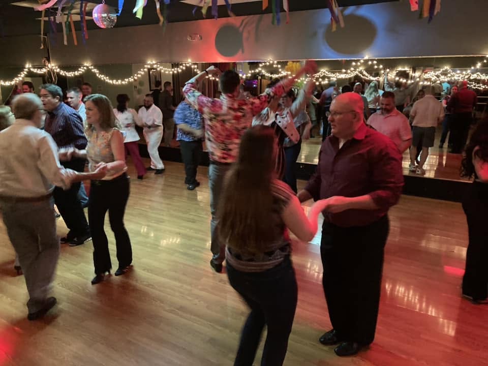 Students dancing together during a DanceFun social dance